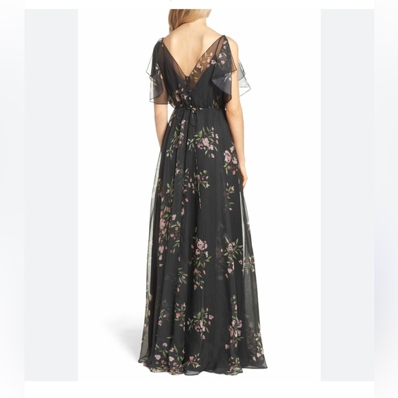 Jenny Yoo Cassie
Flutter Sleeve
Surplice Gown
Black with Floral Pattern. - Picture 6 of 17